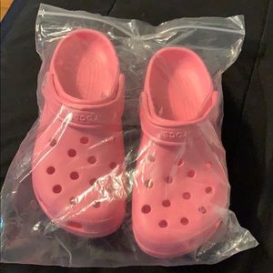 Brand new / never worn Crocs. Electric Pink
